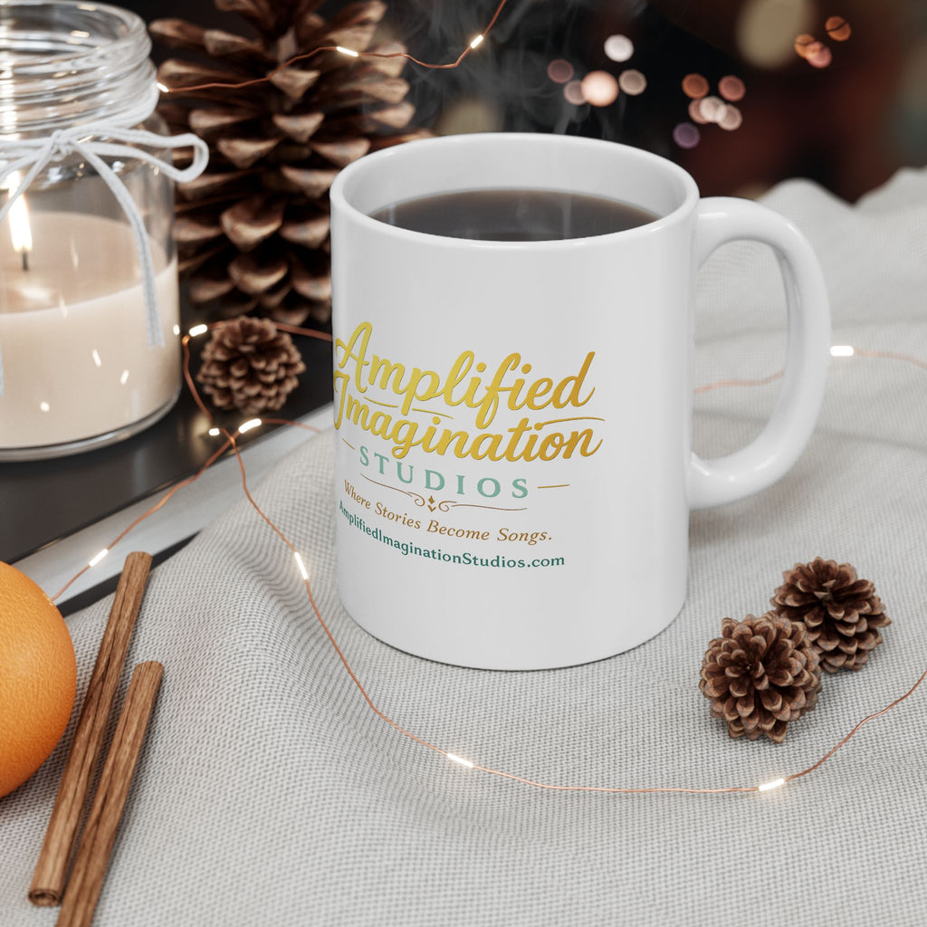 White mug with AIS text on a table with decorative items